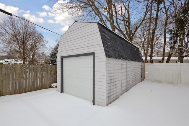 view of snow covered garage