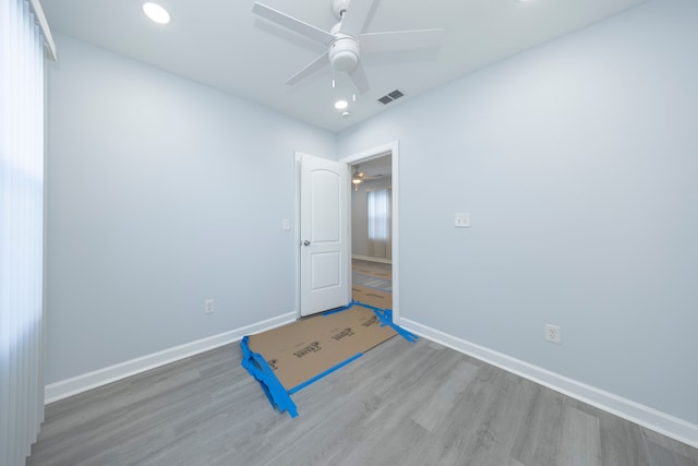 unfurnished bedroom with light hardwood / wood-style flooring and ceiling fan