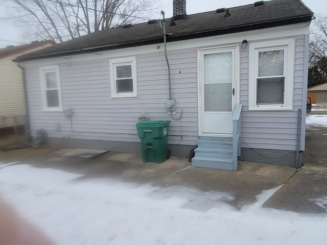 back of property featuring a patio area