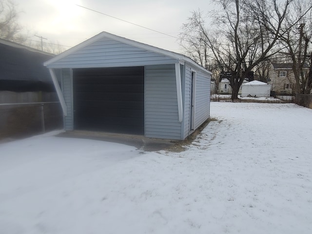 view of snow covered garage