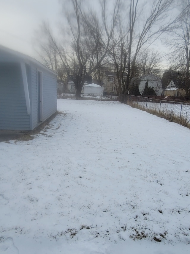 view of yard covered in snow