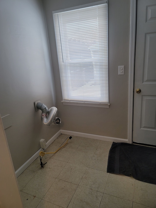 interior space with light tile patterned floors