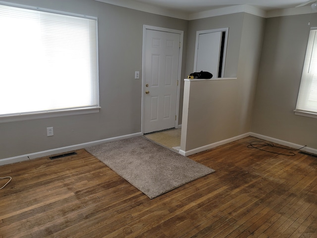 foyer entrance with dark wood-type flooring