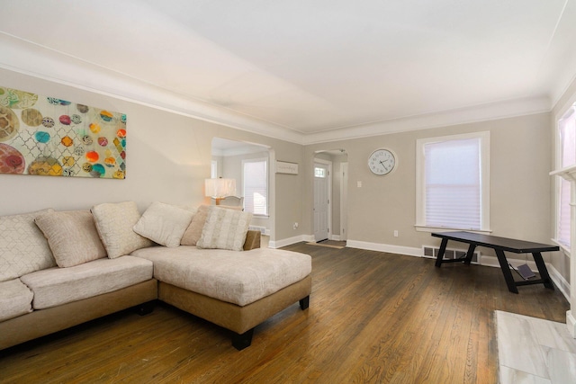 living room featuring ornamental molding and dark hardwood / wood-style floors