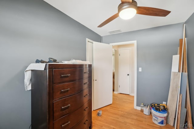 bedroom featuring ceiling fan and light hardwood / wood-style flooring