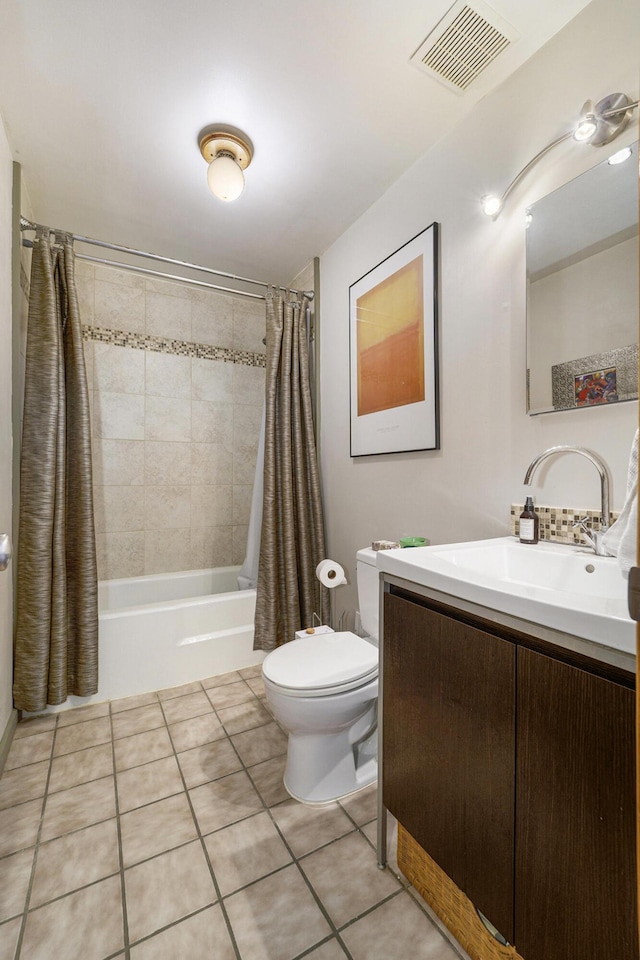 full bathroom with tile patterned flooring, vanity, shower / bathtub combination with curtain, and toilet