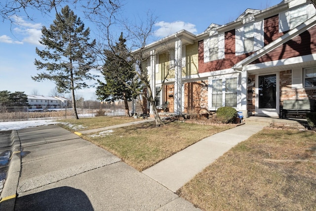 view of front of home with a front yard