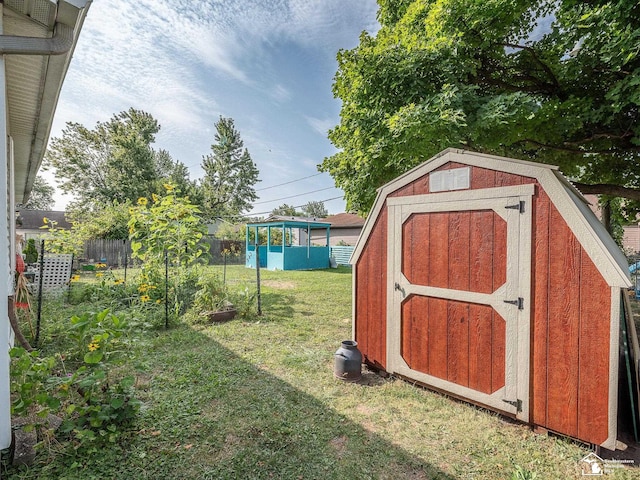 view of outdoor structure with a yard