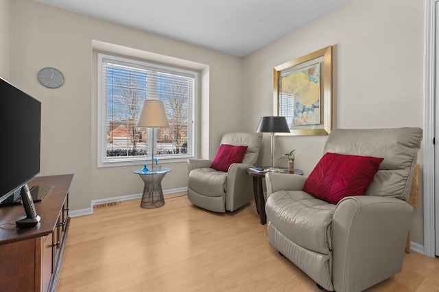 living area featuring light hardwood / wood-style flooring