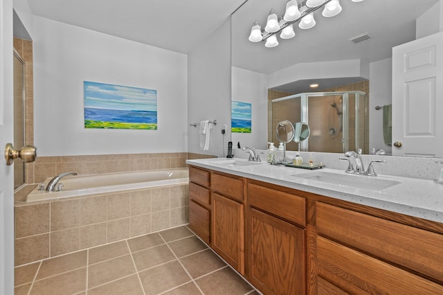 bathroom featuring tile patterned flooring, vanity, and independent shower and bath