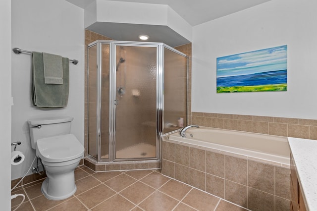 full bathroom with tile patterned floors, toilet, independent shower and bath, and vanity