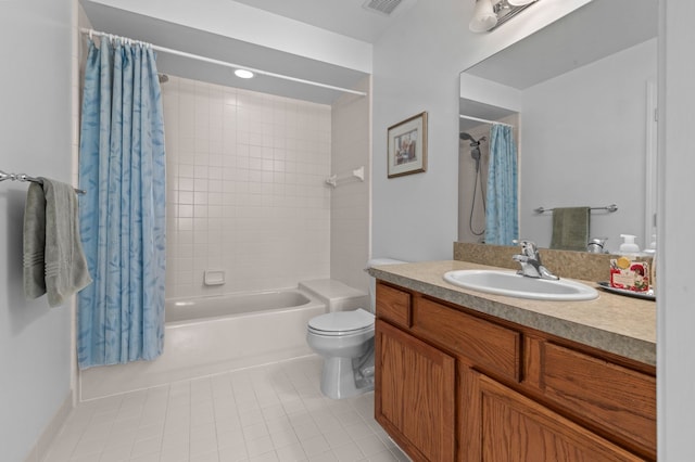 full bathroom with shower / bath combination with curtain, tile patterned floors, vanity, and toilet