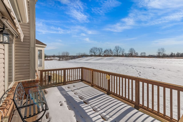 view of snow covered deck