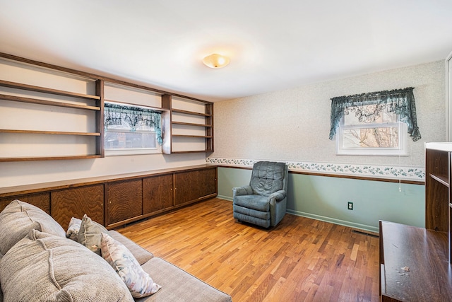 home office with hardwood / wood-style flooring