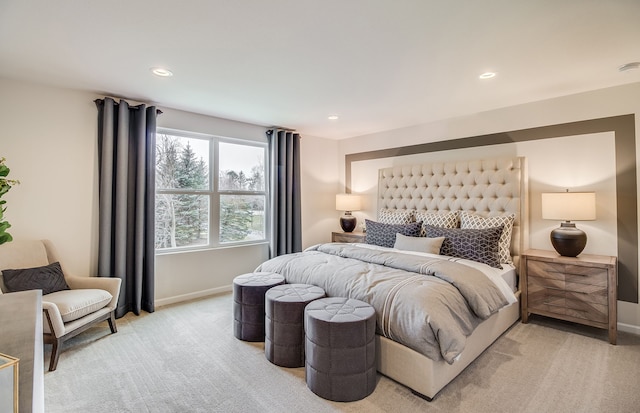 bedroom featuring recessed lighting, baseboards, and light carpet