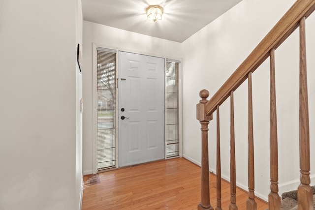 entrance foyer with light wood-type flooring