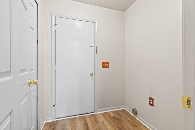 washroom with light wood-type flooring