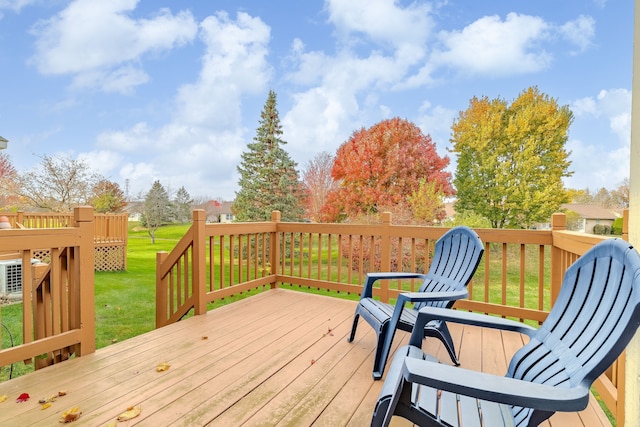 deck featuring a lawn