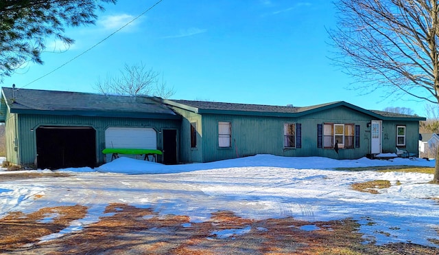 view of front of property featuring an attached garage