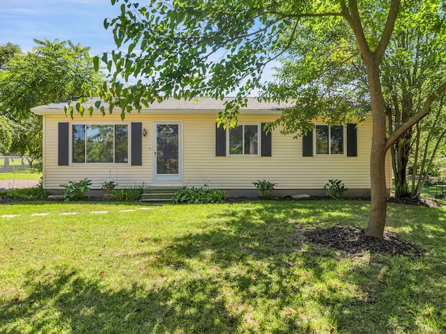 single story home with a front yard