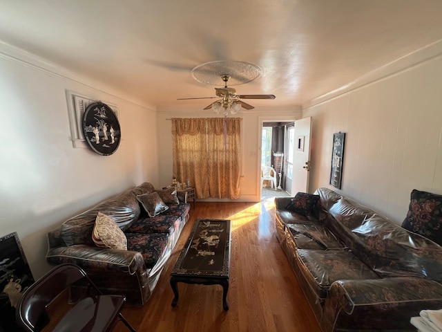 living room featuring hardwood / wood-style flooring and ceiling fan