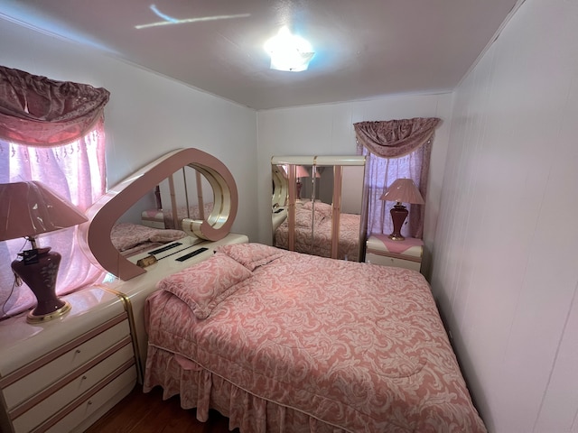 bedroom featuring hardwood / wood-style floors