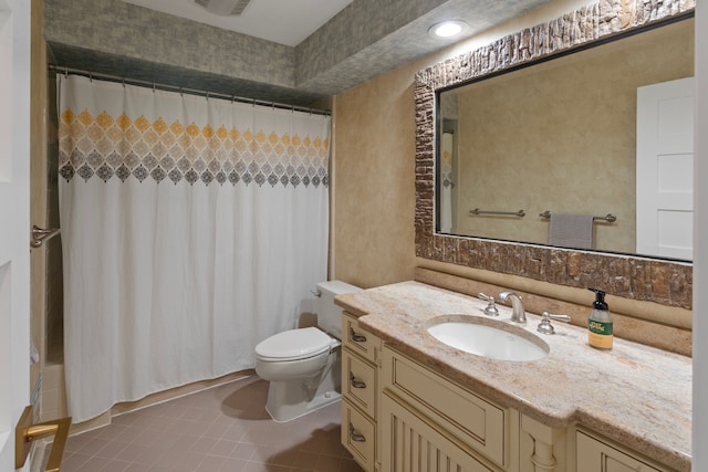 full bathroom with tile patterned flooring, vanity, shower / bath combo, and toilet