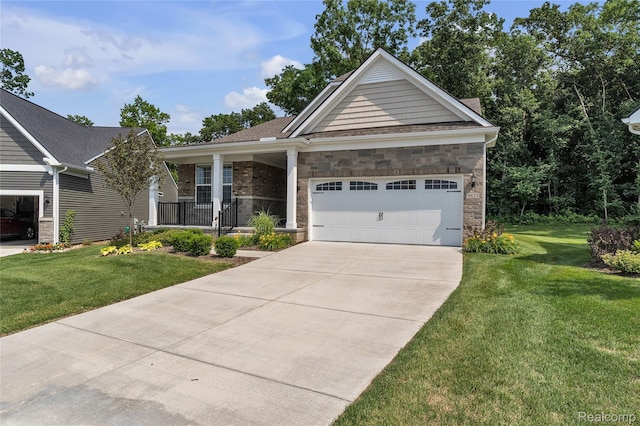 4633 Crestway Dr, Brighton, MI 48116 - view of front of house with an attached garage, a front lawn, covered porch, driveway, and stone siding
