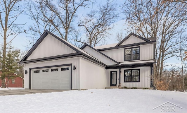 view of front of home with a garage