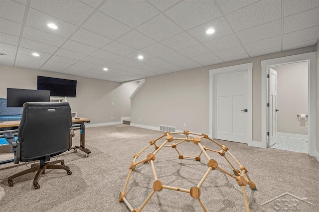 office area featuring a paneled ceiling and carpet