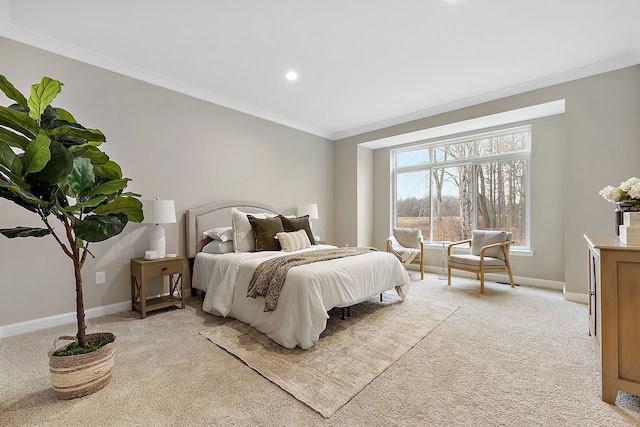 bedroom featuring light colored carpet and ornamental molding