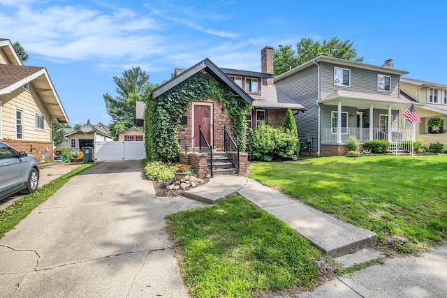 view of front of house featuring a front lawn and a porch