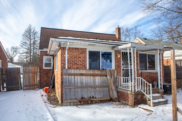 view of front of home featuring central AC unit