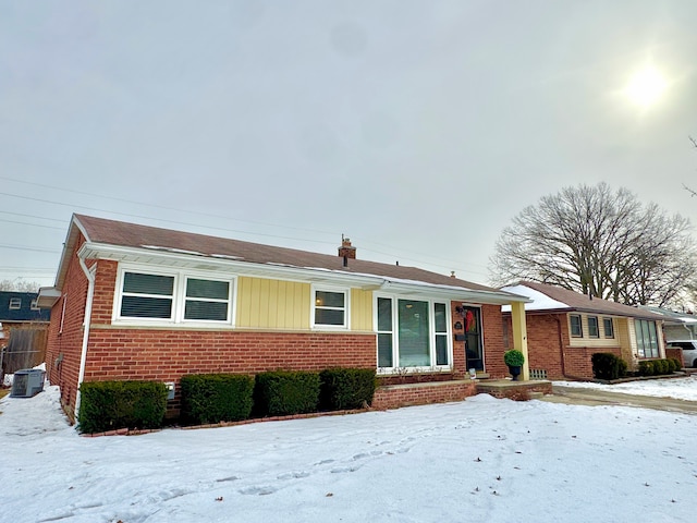 view of front of property featuring cooling unit