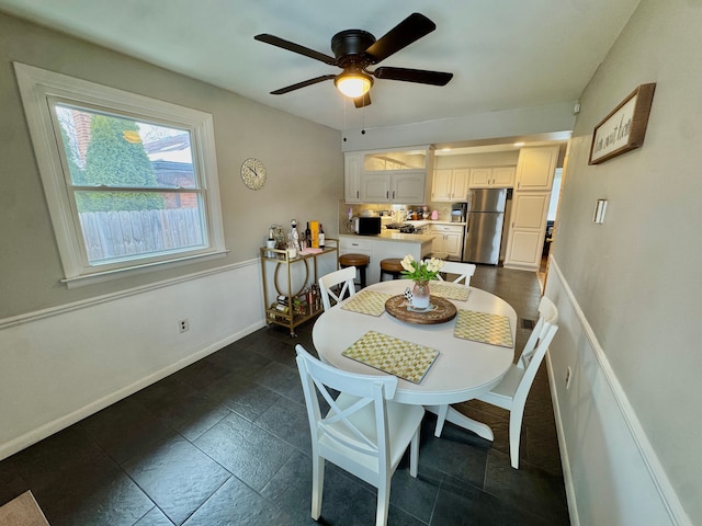 dining area with ceiling fan