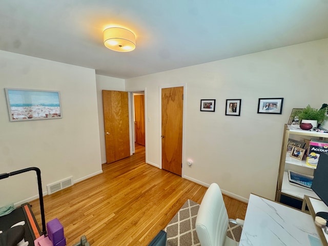 office space featuring light wood-type flooring