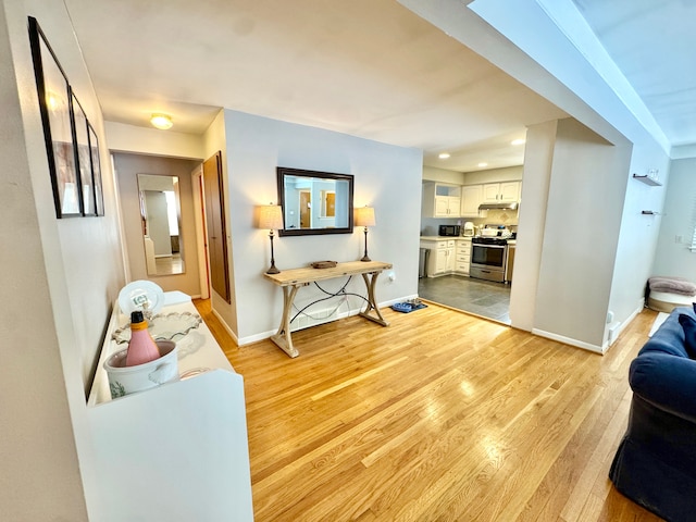 living room with light hardwood / wood-style flooring