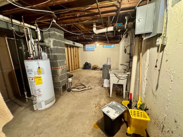 basement featuring gas water heater and electric panel