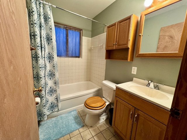 full bathroom featuring tile patterned flooring, vanity, toilet, and shower / tub combo with curtain