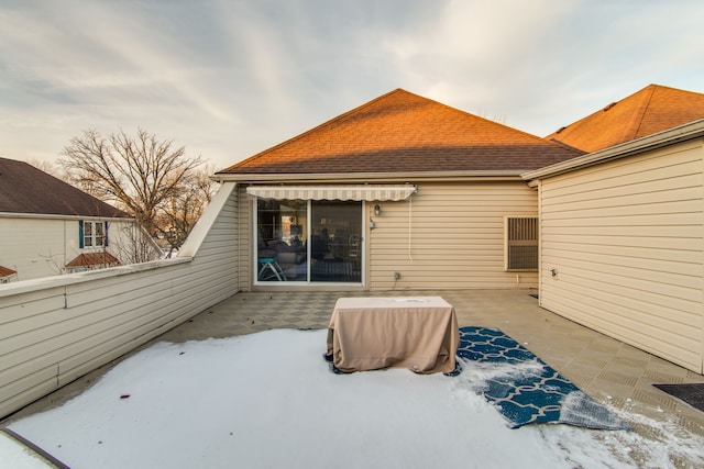 view of snow covered patio