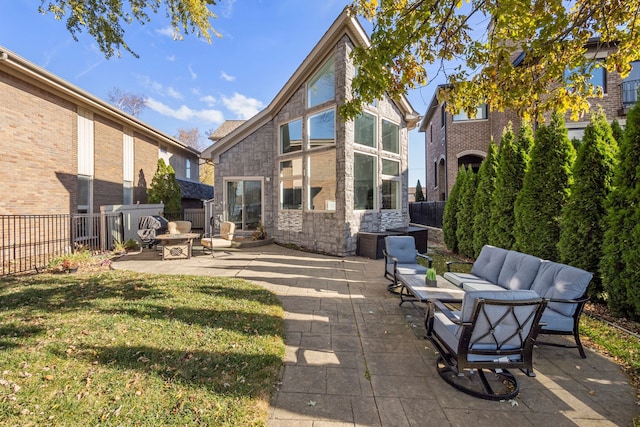 exterior space with a yard, an outdoor hangout area, and a patio area