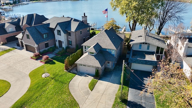 bird's eye view with a water view