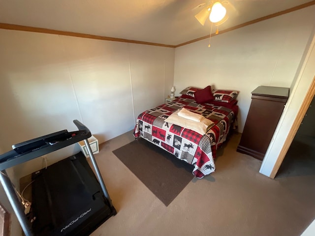 bedroom with crown molding and carpet floors