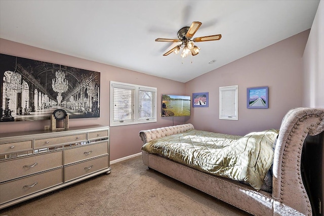 carpeted bedroom featuring ceiling fan and vaulted ceiling