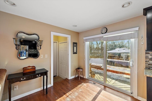 entryway featuring hardwood / wood-style flooring