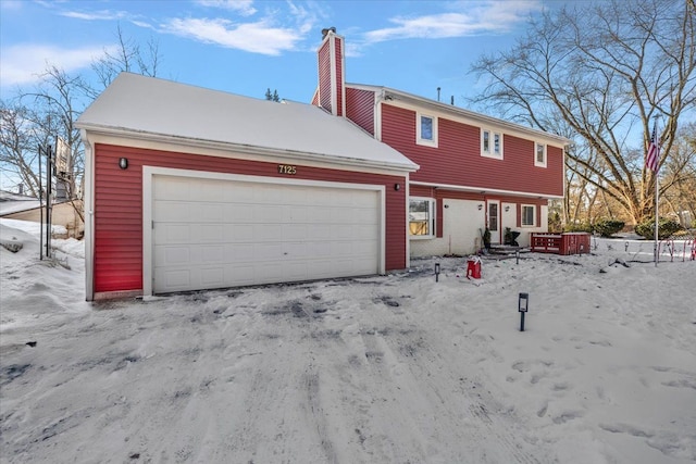 view of front of property featuring a garage