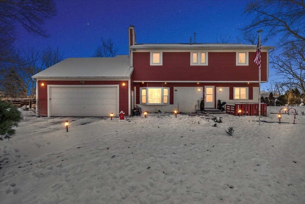 view of front of house with a garage