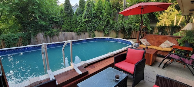 view of pool featuring a deck