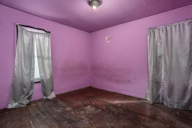 empty room featuring hardwood / wood-style floors