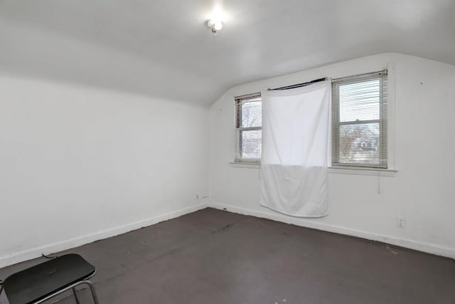 bonus room with vaulted ceiling